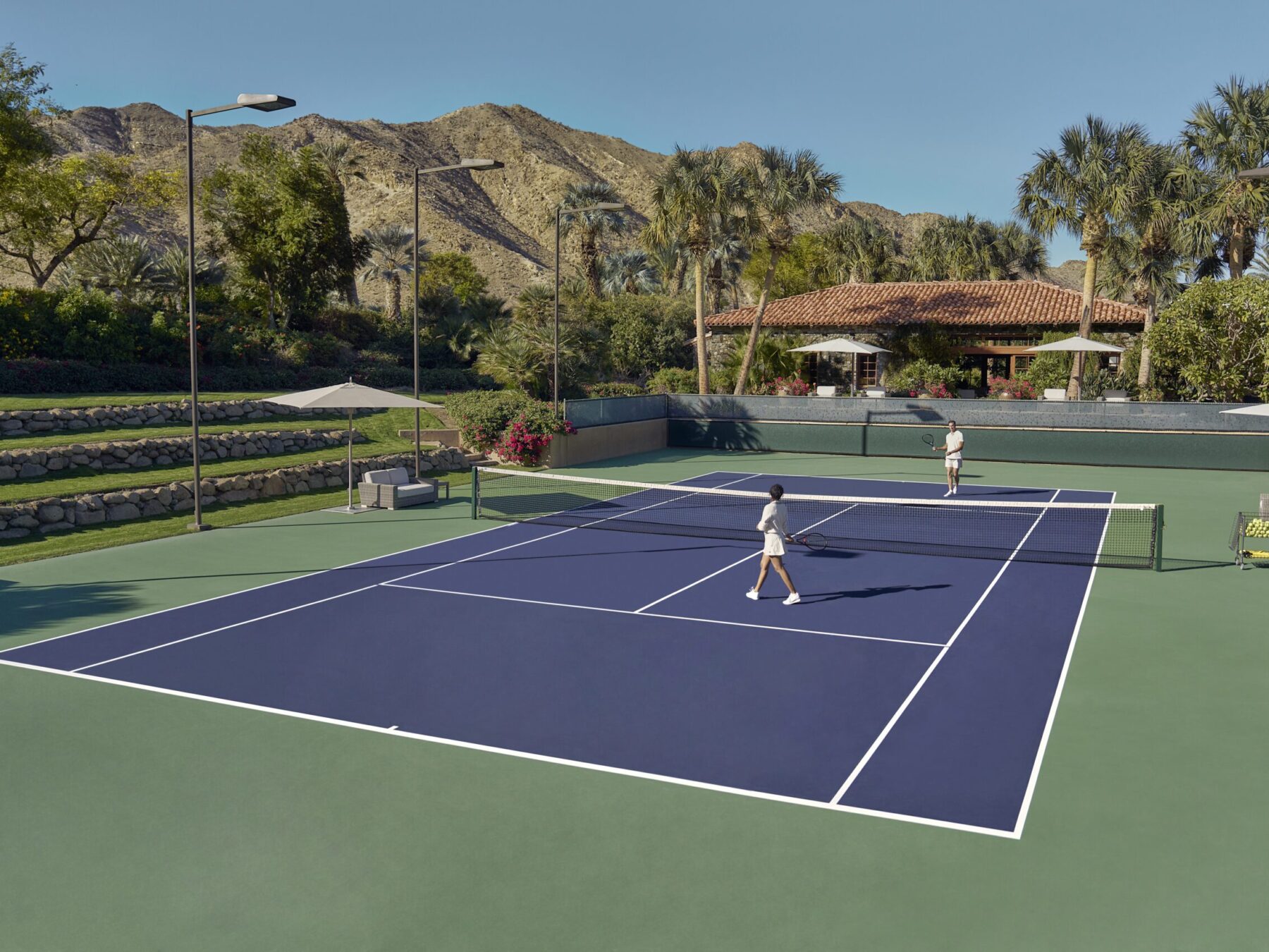 people on a tennis court
